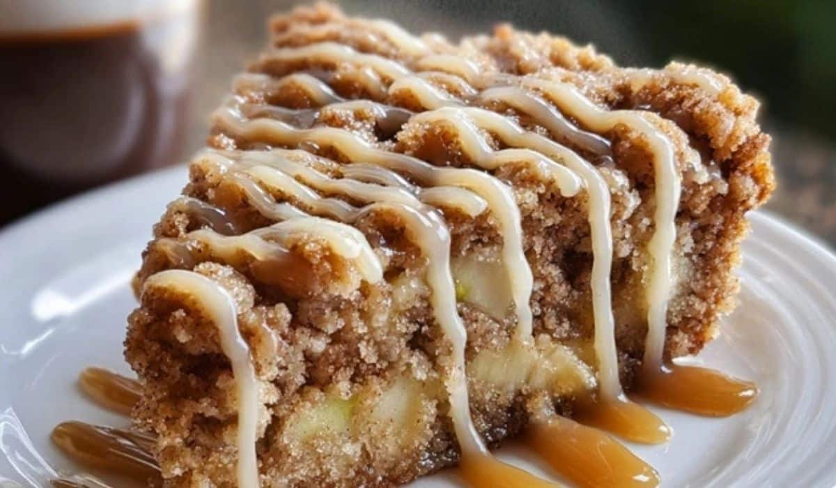 Apple Crumb Cake with Cinnamon Apple Drizzle on rustic table