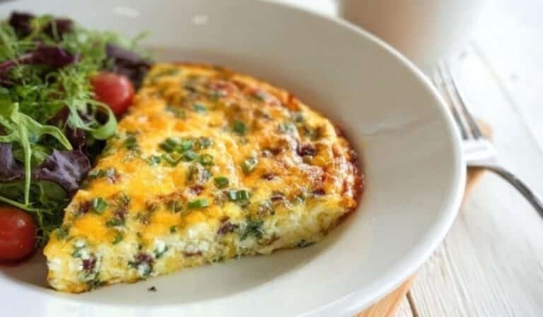 Crustless Quiche baked golden brown in ceramic dish on rustic table