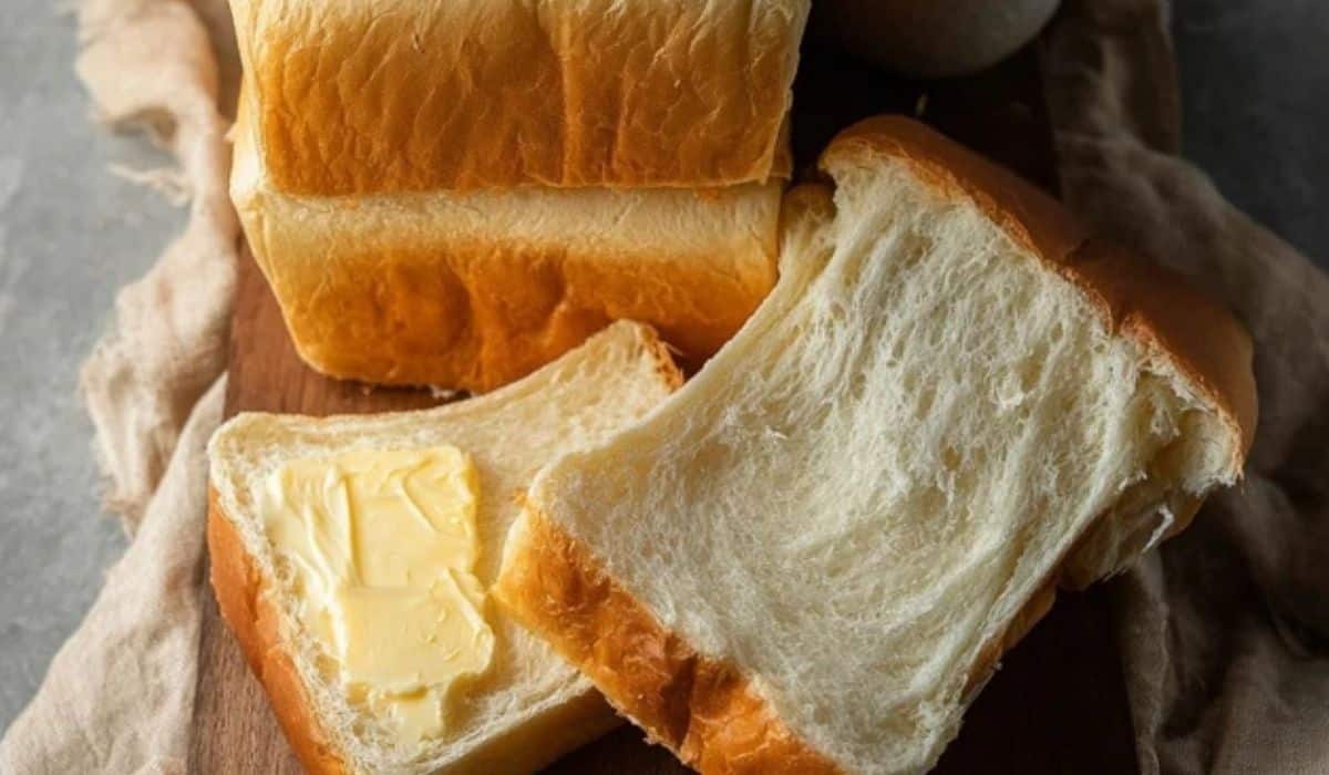 Simple Homemade Milk Bread freshly baked loaf on cooling rack