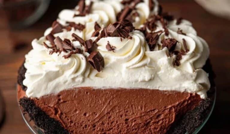 Chocolate Mousse Pie topped with whipped cream and chocolate shavings