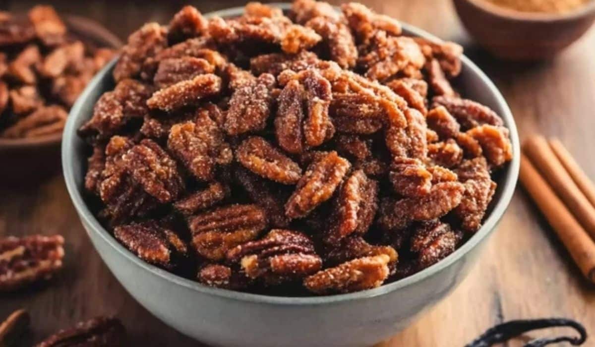 Slow Cooker Candied Pecans in a cozy holiday kitchen