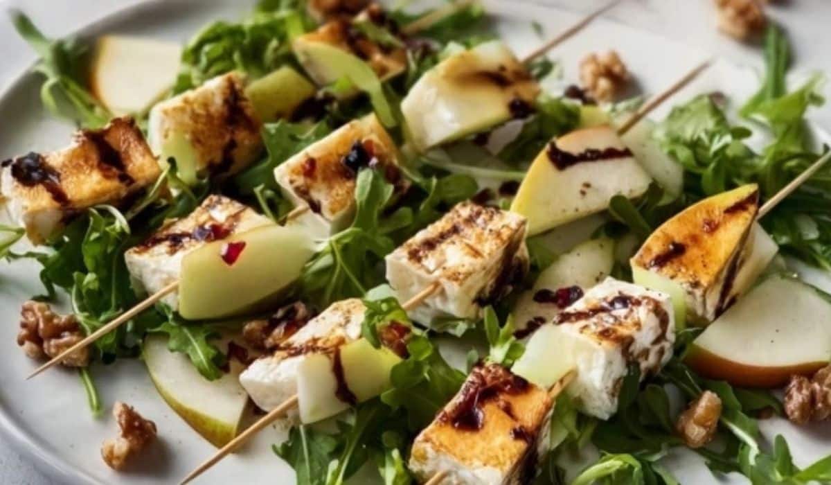 Pear & Brie Cheese Salad Skewers appetizer on wooden board