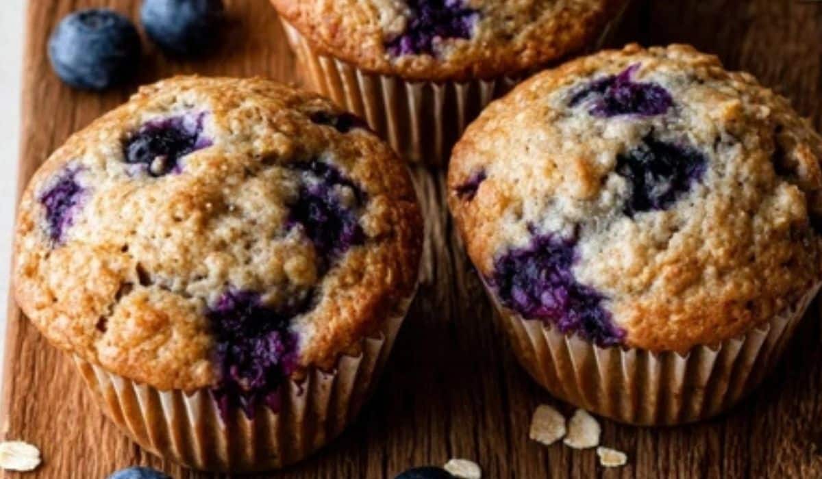 Blueberry Oatmeal Muffins fresh on a rustic wooden table