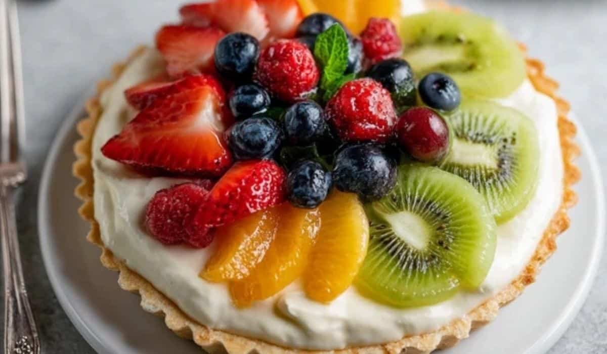 Fruit Tart with Vanilla Mascarpone Cream on wooden table