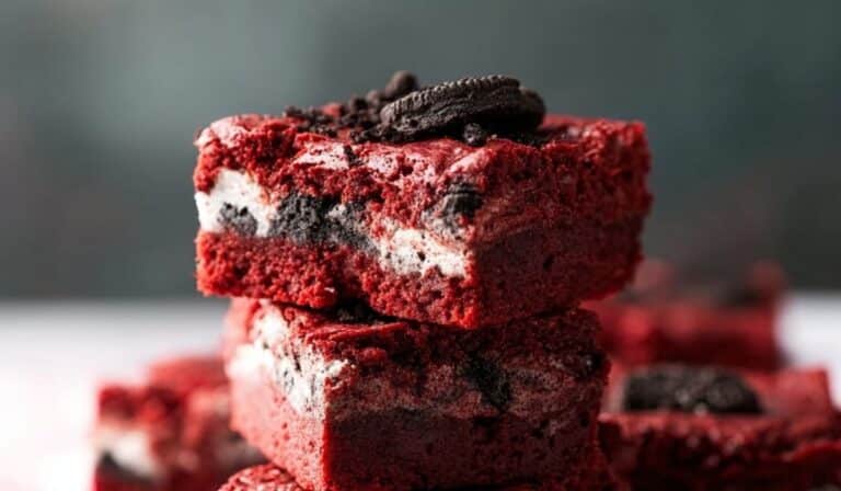 Red Velvet Oreo Brownies on rustic board