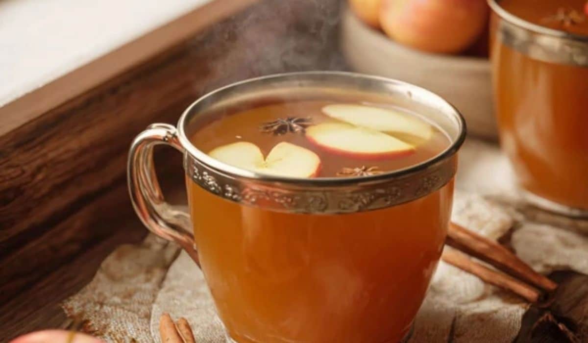 Homemade apple cider in a rustic kitchen setting
