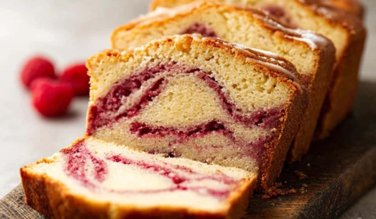 Raspberry Swirl Pound Cake on rustic board