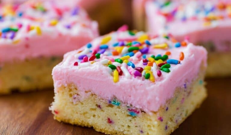 Frosted Sugar Cookie Bars with pink frosting