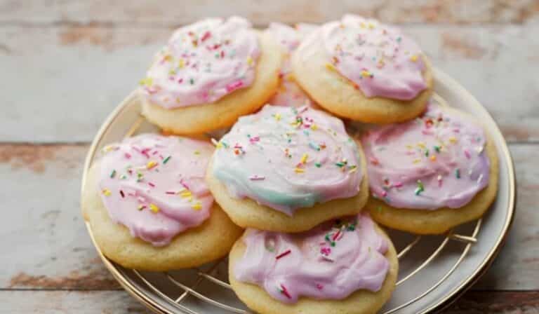 Soft Cakey Sugar Cookies with pastel frosting