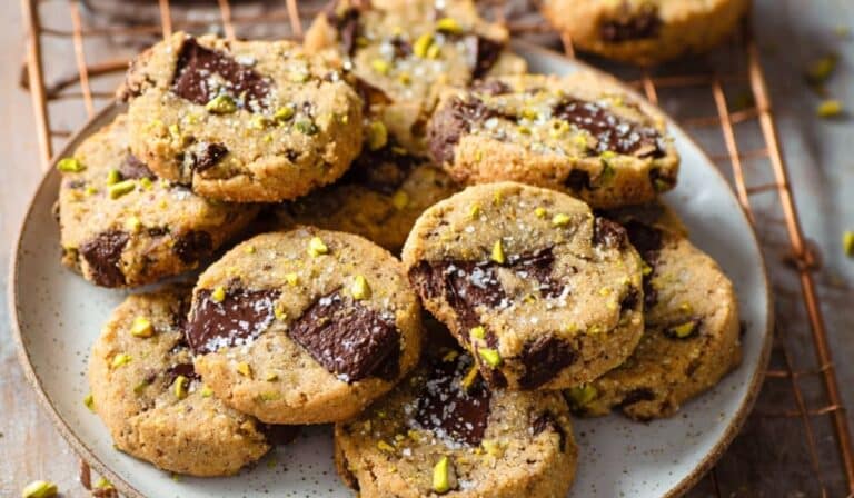 Salted Pistachio Chocolate Chunk Slice and Bake Cookies on rustic table