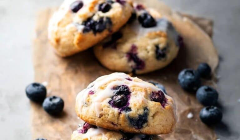 Blueberry Muffin Cookies stacked on a rustic board