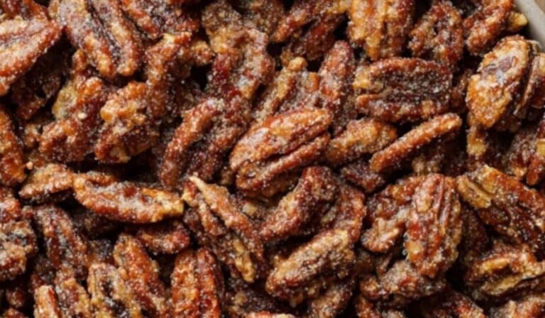 Homemade Candied Pecans in a festive holiday bowl