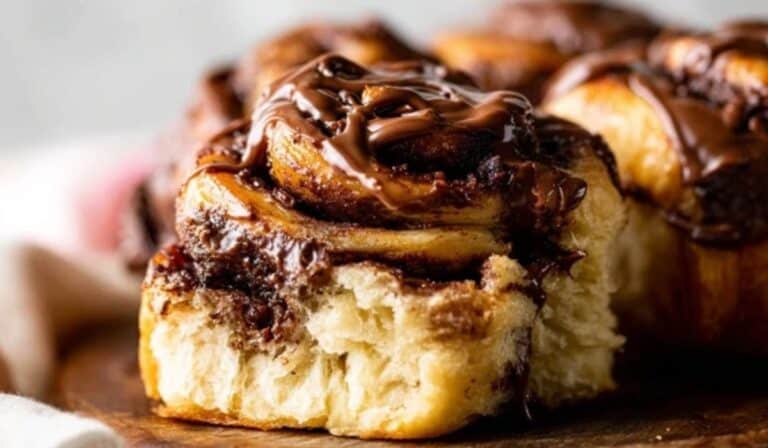 Chocolate Sweet Rolls freshly baked on a rustic table