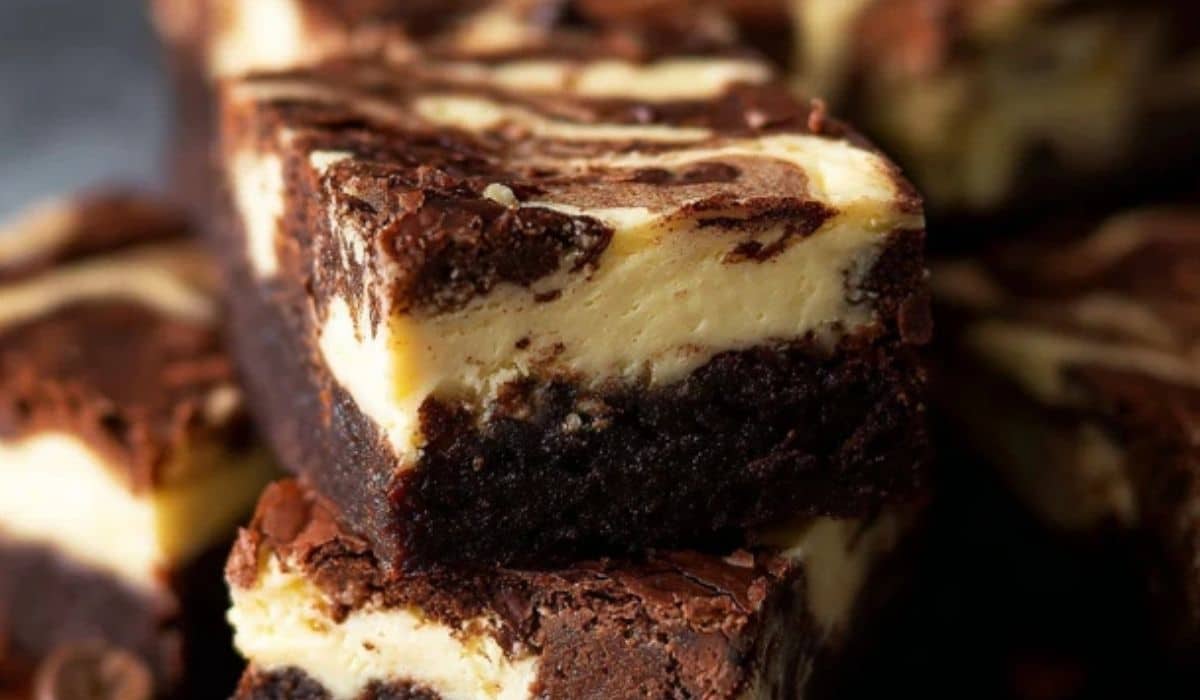 mocha cheesecake brownies stacked with espresso swirl