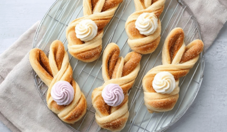 Easter Bunny Twists on a platter with cinnamon sugar and frosting tails