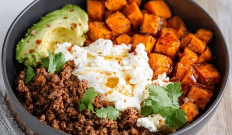 Cottage Cheese Sweet Potato Beef Bowl with hot honey, avocado, and taco beef