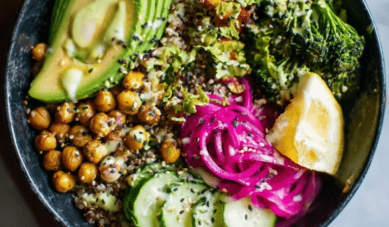 Buddha bowl with quinoa, roasted veggies, chickpeas, and tahini drizzle