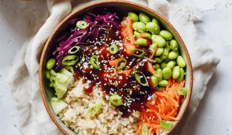 Rainbow Vegetable Edamame Bowls with Teriyaki Sauce topped with sesame and scallions