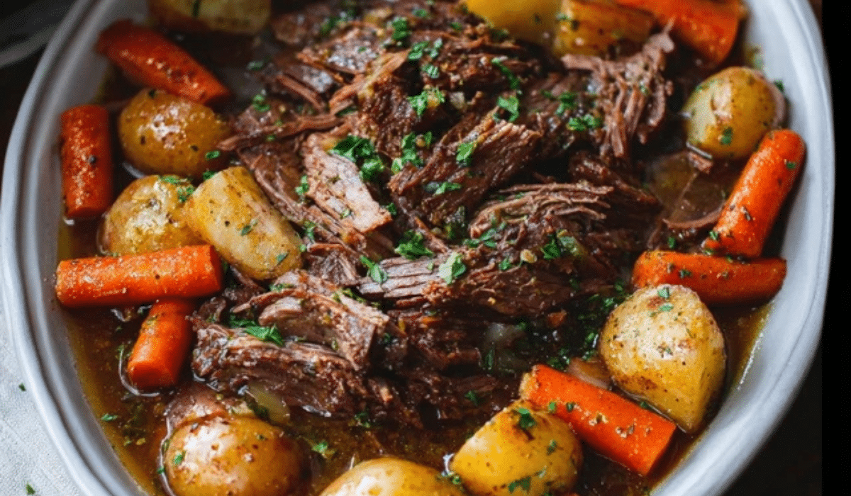 Perfect Slow Cooker Pot Roast with carrots and potatoes in rich gravy